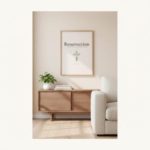 Christian Floral Cross Easter Art, Scripture Wall Decor, in beautiful floral cross composed of spring roses, greenery and wildflowers, displayed in a beautifully styled modern living room above a warm wooden sideboard with soft natural light creating gentle shadows on the frame, — a meaningful newborn gift and beautiful Christian home decor