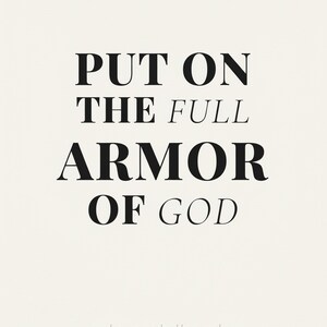 Ephesians 6 Wall Art Put on the Full Armor of God Scripture Print Christian Boys, in contemporary bold serif typography in black on clean white background, displayed in a bright modern entryway next to a coat rack with natural greenery, serving as welcoming faith-filled home decor