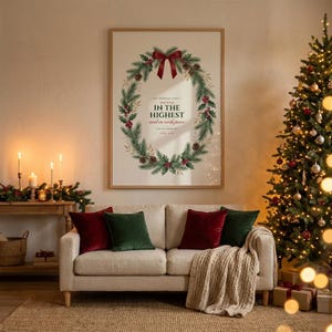 Luke 2:14 Glory to God In the Highest nativity scripture print from the Christmas Story set, slim frame behind glass on a cozy Christmas living room wall, decorated tree with warm fairy lights and lit candles, festive evening glow. Printable Christian Christmas wall art instant digital download by TheFramedVerse on Etsy.