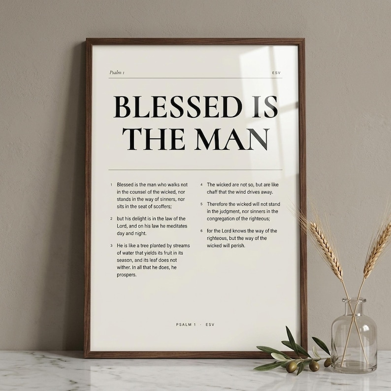 Psalm 1 'Blessed Is The Man' editorial Bible verse art in a slim walnut frame, leaning on white Carrara marble next to a clear glass bud vase with a single olive branch. Premium Pinterest-worthy Christian editorial print, Father's Day digital download from TheFramedVerse on Etsy.