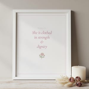 Pink Coquette Christian Wall Art Set of 9 Bible Verse Scripture Print Blush Flor — front facing framed mockup on clean white wall with shadow. This coquette bow, botanical, pink blush christian scripture wall art print features beautiful serif typography on warm cream background. digital download printable for home office bedroom living room gallery wall decor. Perfect christian gift idea from ...