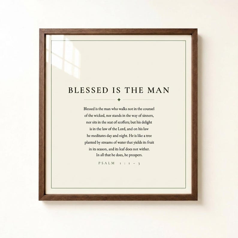 Close hero shot of Psalm 1 Blessed Is The Man printable wall art in a classic walnut frame against a warm white wall. Full Psalm 1:1-3 scripture text in clean modern typographic layout, dark forest green on cream. Minimalist christian art print, perfect Father's Day gift for dad. Digital download by TheFramedVerse, 300 DPI.