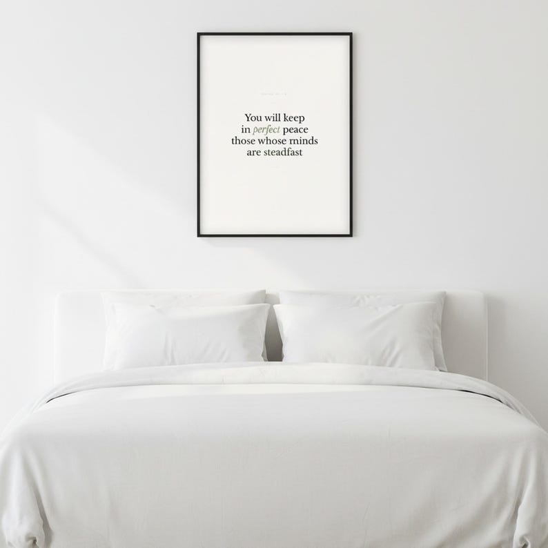 Isaiah 26:3 Wall Art You Will Keep in Perfect Peace Minimalist Scripture Print B — front facing framed mockup on clean white wall with shadow. This modern minimalist christian scripture wall art print features beautiful serif typography on warm cream background. Isaiah 26:3 bible verse digital download printable for home office bedroom living room gallery wall decor. Perfect christian gift idea...