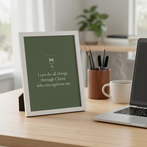 I Can Do All Things Philippians 4 13 Wall Art Sage Coquette Christian Print Dark — close-up detail of typography and paper texture. This sage green, coquette bow christian scripture wall art print features beautiful serif typography on warm cream background. Philippians 4 13 bible verse digital download printable for home office bedroom living room gallery wall decor. Perfect christian gift ide...