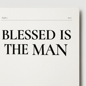 Closeup detail shot of Psalm 1 'Blessed Is The Man' Bible verse wall art print on matte fine-art paper, showing the crisp Cormorant Display all-caps headline, the Psalm 1 ESV tag-line, and the body verse text in 2-column layout. Premium editorial Christian print, Father's Day gift, instant digital download from TheFramedVerse on Etsy.