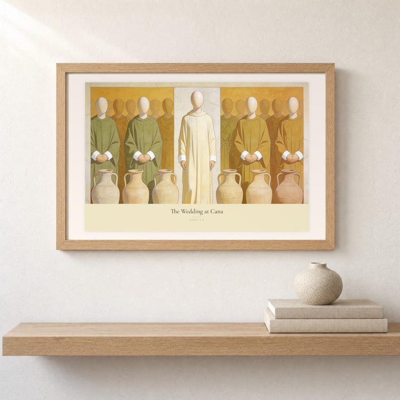 Shelf mockup of The Wedding at Cana in a light oak frame resting on a pale wood surface beside stacked neutral books and a rounded ceramic vase. The framed print shows Christ centered between six complete stone jars, with three on the left and three on the right. Cream matting, soft wall texture, and natural light present the horizontal Bible artwork at an easy domestic scale.