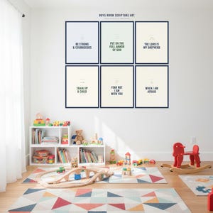 Christian Boys Room Wall Art Set of 6 Bible Verse Prints Navy Adventure Scriptur — hero framed product shot with glass reflection and premium frame. This nursery, navy blue christian scripture wall art print features beautiful serif typography on warm cream background. digital download printable for home office bedroom living room gallery wall decor. Perfect christian gift idea from TheFramedVe...