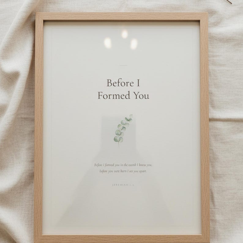 Nursery Bible Verse Wall Art Set of 6 Printable Christian Scripture Prints, in gentle sage green nursery design with soft botanical watercolor illustration and calming earth tones, styled on a wooden floating shelf next to a ceramic vase with dried eucalyptus, creating a warm and inviting Christian home decor vignette