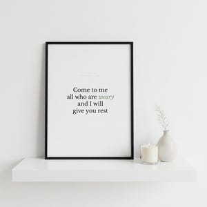 Matthew 11:28 Wall Art Come to Me All Who Are Weary Minimalist Scripture Print B — close-up detail of typography and paper texture. This modern minimalist christian scripture wall art print features beautiful serif typography on warm cream background. Matthew 11:28 bible verse digital download printable for home office bedroom living room gallery wall decor. Perfect christian gift idea from The...