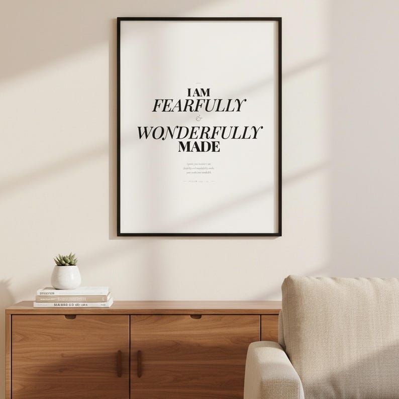 Psalm 139 14 Wall Art Fearfully and Wonderfully Made Scripture Print Nursery, — "I praise you because I am fearfully and wonderfully made; your works are wonderful", in gentle sage green nursery design with soft botanical watercolor illustration and calming earth tones, hanging in a serene sage green nursery above a rattan bassinet with a cozy white blanket, macrame wall hanging