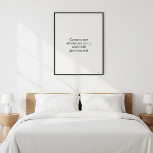 Matthew 11:28 Wall Art Come to Me All Who Are Weary Minimalist Scripture Print B — front facing framed mockup on clean white wall with shadow. This modern minimalist christian scripture wall art print features beautiful serif typography on warm cream background. Matthew 11:28 bible verse digital download printable for home office bedroom living room gallery wall decor. Perfect christian gift id...