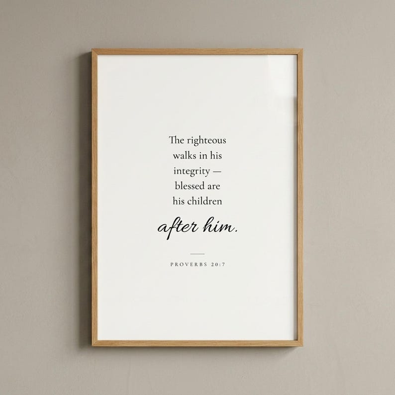 Studio front shot of Proverbs 20:7 'The Righteous Walks in Integrity' scripture print in slim warm oak wood frame on warm greige wall. Clean editorial product photography — Father's Day Christian wall art, Christian dad and grandfather gift, pastor and men's ministry print, instant digital download.