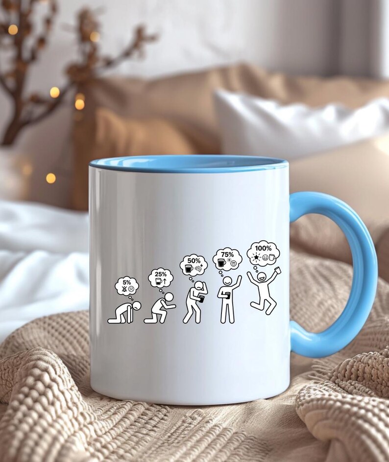 K&ouml;nnte beinhalten: Wei&szlig;er Keramikbecher mit hellblauem Henkel und Rand. Der Becher zeigt eine schwarz-wei&szlig;e Grafik, die die Kaffeeaufnahme einer Person von 5 % bis 100 % darstellt.