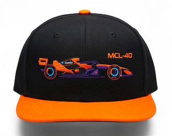 McLaren F1 Cap/Snapback Hat in embroidered design of the 2026 MCL-40 car, side profile. Collectable item