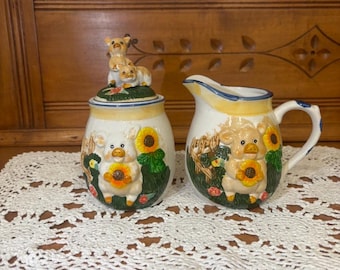 Whimsical Ceramic Sugar Bowl and Creamer Set, Featuring a Pig and Sunflower Pattern