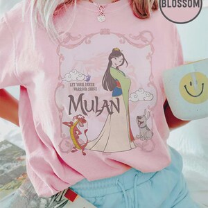 May include: A set of three ceramic mugs with a speckled, matte finish. The mugs are in cream, light grey, and dark grey. Each mug has a simple, minimalist design, ideal for coffee or tea.