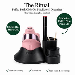 May include: A pink and black Puffco Peak Click-On Stabilizer & Organizer. The set includes a pink device with a silver band, a black organizer with a tool, swabs, and jar storage. The text reads "The Ritual" and "One Click. Complete Control."