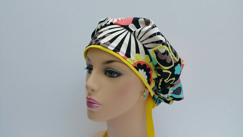 100 /% Cotton Flowers and Petals Over A Dark Ground Bouffant CapMedical CapSurgical Scrub Hat