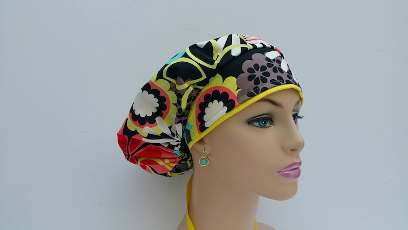 100 /% Cotton Flowers and Petals Over A Dark Ground Bouffant CapMedical CapSurgical Scrub Hat