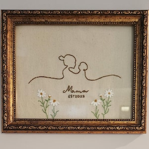 May include: A white ceramic mug with a black handle and the text "But First, Coffee" in a bold, black font. The mug is set against a blurred background, suggesting a cozy setting. The mug appears to be approximately 4 inches tall.