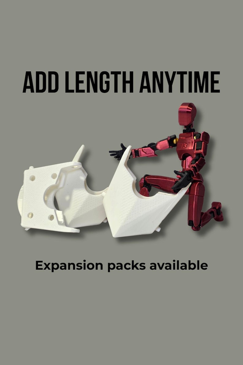 May include: A metallic red articulated action figure kneeling beside two white 3D-printed plastic components with textured surfaces. The text ADD LENGTH ANYTIME appears at the top, and the text Expansion packs available appears at the bottom.