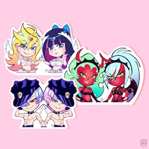May include: A collection of colorful anime-style stickers featuring various characters. The stickers showcase characters with angel wings, devil horns, and police hats. The characters have unique hairstyles and outfits, set against a pink background.