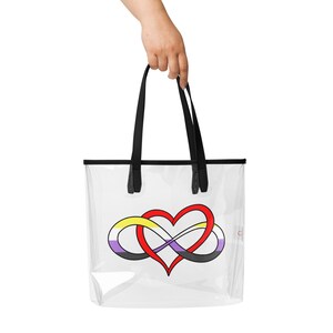 May include: Clear tote bag with black handles and trim. The bag features a colorful design of a heart intertwined with an infinity symbol, incorporating the colors of the non-binary flag: yellow, white, purple, and black.