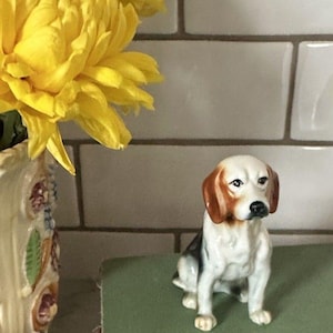 May include: A rustic wooden sign with the text "Welcome to our home" in white lettering. The sign features a distressed finish and a simple, inviting design, perfect for entryway decor.