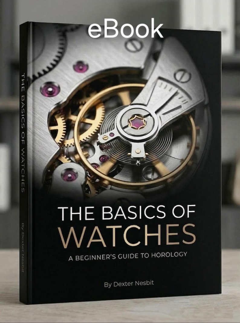 May include: A book cover titled "THE BASICS OF WATCHES" with a detailed image of watch gears. The cover is black with gold and white text. The author's name, Dexter Nesbit, is also displayed. The book is an eBook.