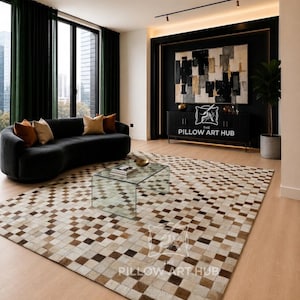 May include: A large area rug featuring a geometric checkerboard pattern in shades of brown, beige, and white. The rug is placed in a room with a curved black sofa, a glass coffee table, and a black sideboard with the text THE PILLOW ART HUB.