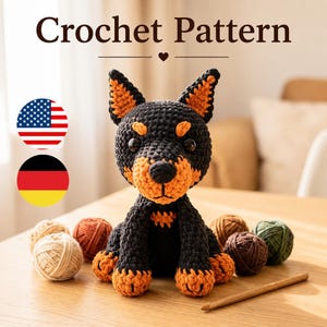 May include: A handmade crochet dog in black and orange, with the words "Crochet Pattern" above. The dog is surrounded by balls of yarn in various colors. The American and German flags are in the upper left corner.
