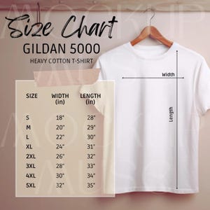 May include: A white Gildan 5000 heavy cotton t-shirt hangs on a wooden hanger. A size chart shows measurements in inches for sizes S to 5XL, including width and length. The chart is labeled "Size Chart".