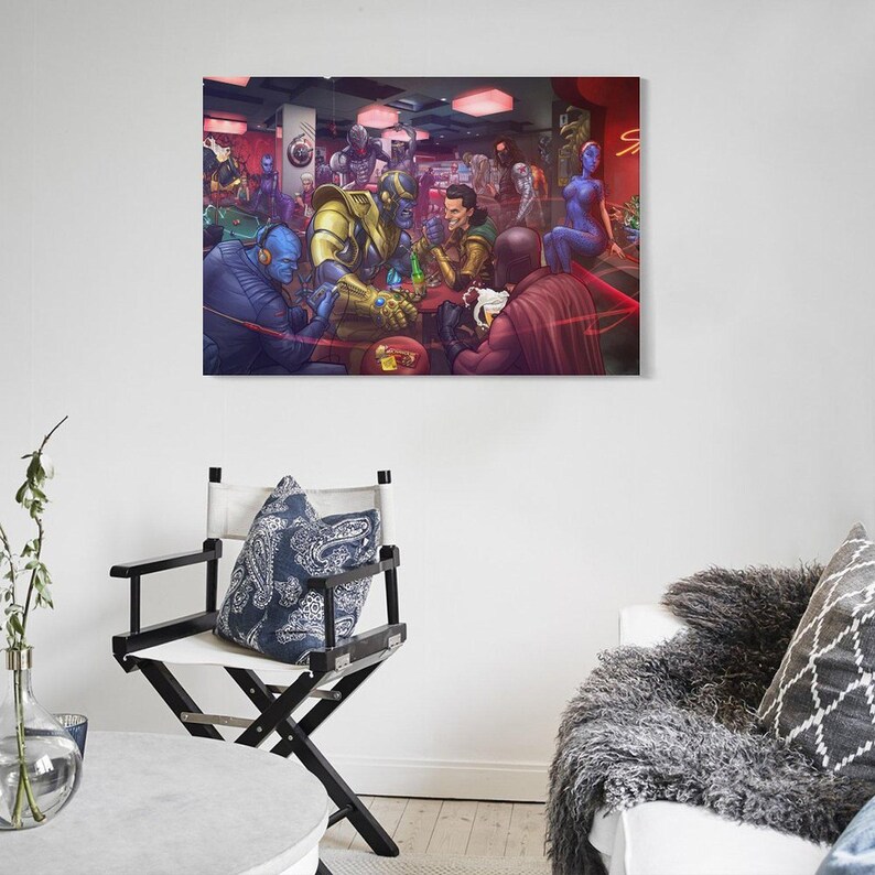 May include: A framed art print depicts a bar scene with various comic book characters. The artwork features a vibrant color palette, with characters in gold, blue, and red. The setting is a dimly lit bar with red neon lights.