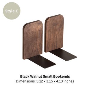 May include: A pair of black walnut small bookends with a dark brown wood grain finish. The bookends have a rectangular base and a curved top. Dimensions: 5.12 x 3.15 x 4.13 inches. The text "Style C" is in a light green circle.