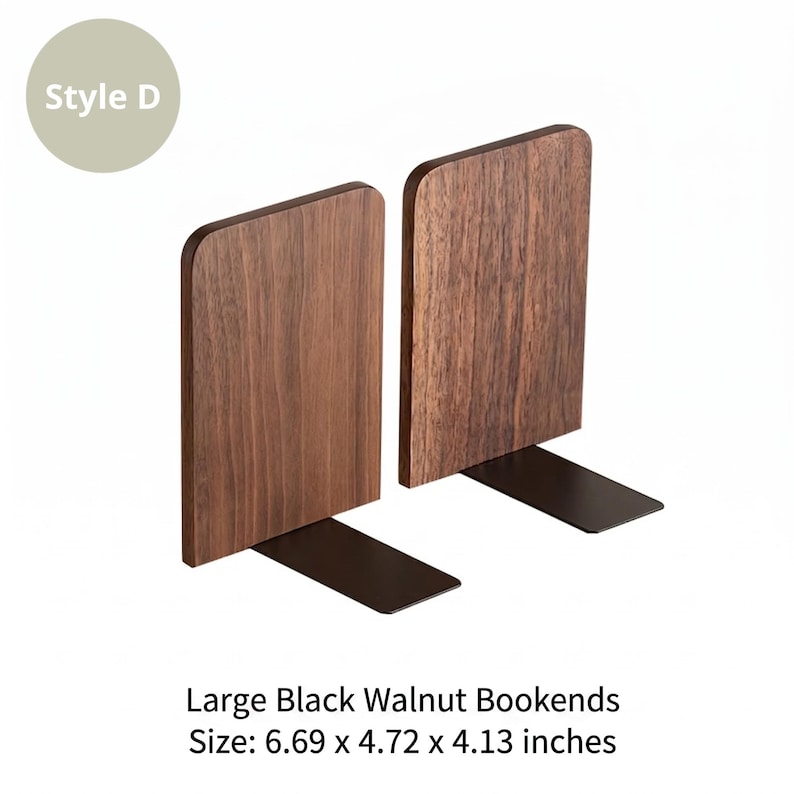 May include: Pair of large black walnut bookends. Each bookend has a rectangular wooden face with a dark brown finish, mounted on a black metal base. The text "Style D" is in a light green circle. The size is 6.69 x 4.72 x 4.13 inches.