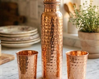Ayurveda 100% Pure Hammered Copper Water Bottle  Ayurvedic Detox Drinking Bottle with Screw Lid, Eco Friendly Reusable Copper Drinkware