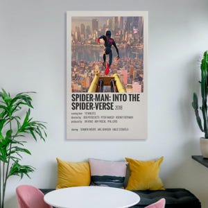 May include: A framed poster for the animated film "Spider-Man: Into the Spider-Verse" featuring a dynamic image of Spider-Man leaping over a cityscape. The poster includes the film's title, year, and credits.