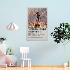 May include: A framed poster for the animated film "Spider-Man: Into the Spider-Verse" from 2018. The poster features Spider-Man running across a yellow structure with a cityscape in the background. The title and credits are displayed in a minimalist style.