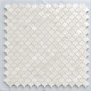 May include: A square mosaic tile sheet featuring a repeating white scalloped fish scale pattern. The individual tiles have a pearlescent, iridescent finish and are mounted on a clear blue grid backing for alignment during installation.