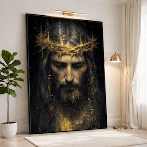 May include: A framed portrait depicts a solemn figure with long hair and a beard, wearing a golden crown of thorns. The artwork features a dark background with golden accents, creating a dramatic and reverent atmosphere. The portrait is displayed in a well-lit room.