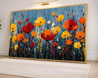 May include: A large rectangular wall art piece in a gold frame featuring an abstract floral painting. The artwork displays vibrant red and yellow poppy flowers against a textured dark blue background with vertical paint splatters and strokes.