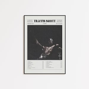 May include: A framed poster featuring Travis Scott's album "Utopia." The poster has a black and white image of a person with their arms raised. The poster includes the album title, tracklist, and release date.