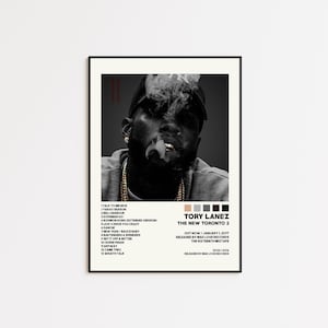 May include: A framed poster featuring a black and white image of Tory Lanez smoking. The poster includes the album title "The New Toronto 2" and a tracklist. Released January 1, 2017.
