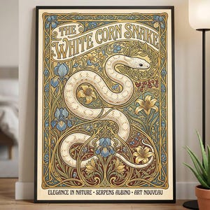 May include: A framed rectangular poster featuring a white corn snake coiled amidst intricate blue and yellow floral patterns. The text reads THE WHITE CORN SNAKE at the top and ELEGANCE IN NATURE • SERPENS ALBINO • ART NOUVEAU at the bottom.