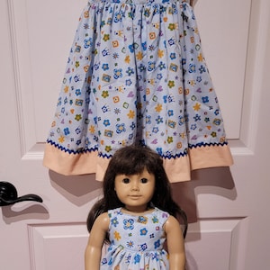Size 4 Blue floral sundress with matching doll Dress