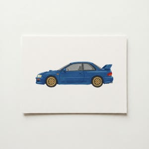 May include: A blue sports car illustration with gold wheels and a rear spoiler. The car is painted on a white background. The car has a two-door coupe design.
