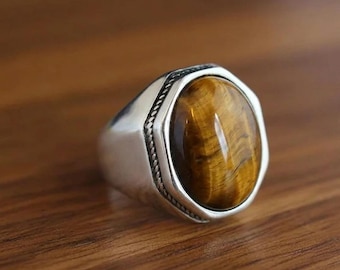 Pierścień sygnetowy męski z tygrysim okiem ze srebra próby 925, owalny kaboszon (12 x 16 mm)
