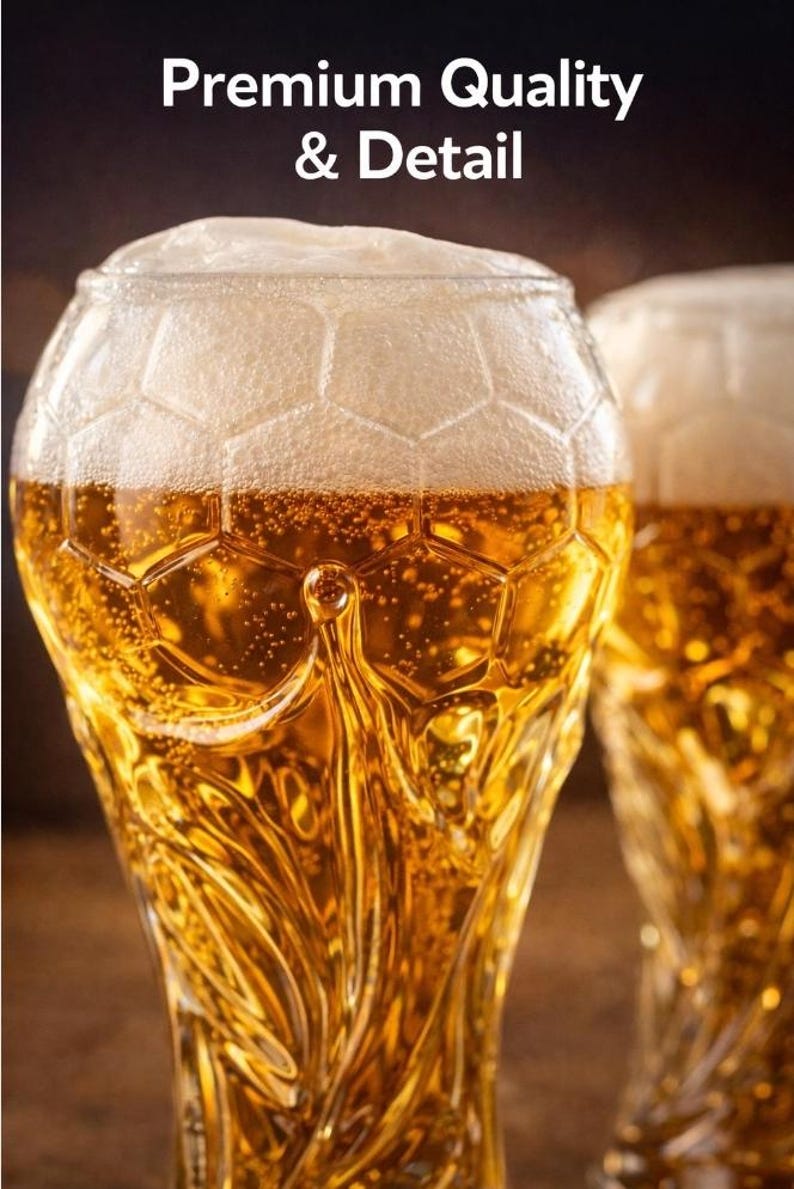 May include: A clear glass beer mug with a textured soccer ball pattern on the upper portion and a swirling base design, filled with golden beer and white foam. The text Premium Quality & Detail is displayed at the top of the image.