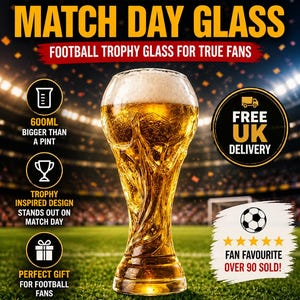 May include: A 600ml football trophy glass filled with beer, with the text "MATCH DAY GLASS". The glass is on a green football pitch with stadium lights. The text "Football Trophy Glass for True Fans" is also visible.