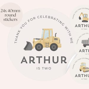 May include: Round stickers measuring 40mm in diameter featuring a yellow construction vehicle illustration. The text reads THANK YOU FOR CELEBRATING WITH ME, ARTHUR, IS TWO. The design includes various construction vehicles like an excavator and dump truck.